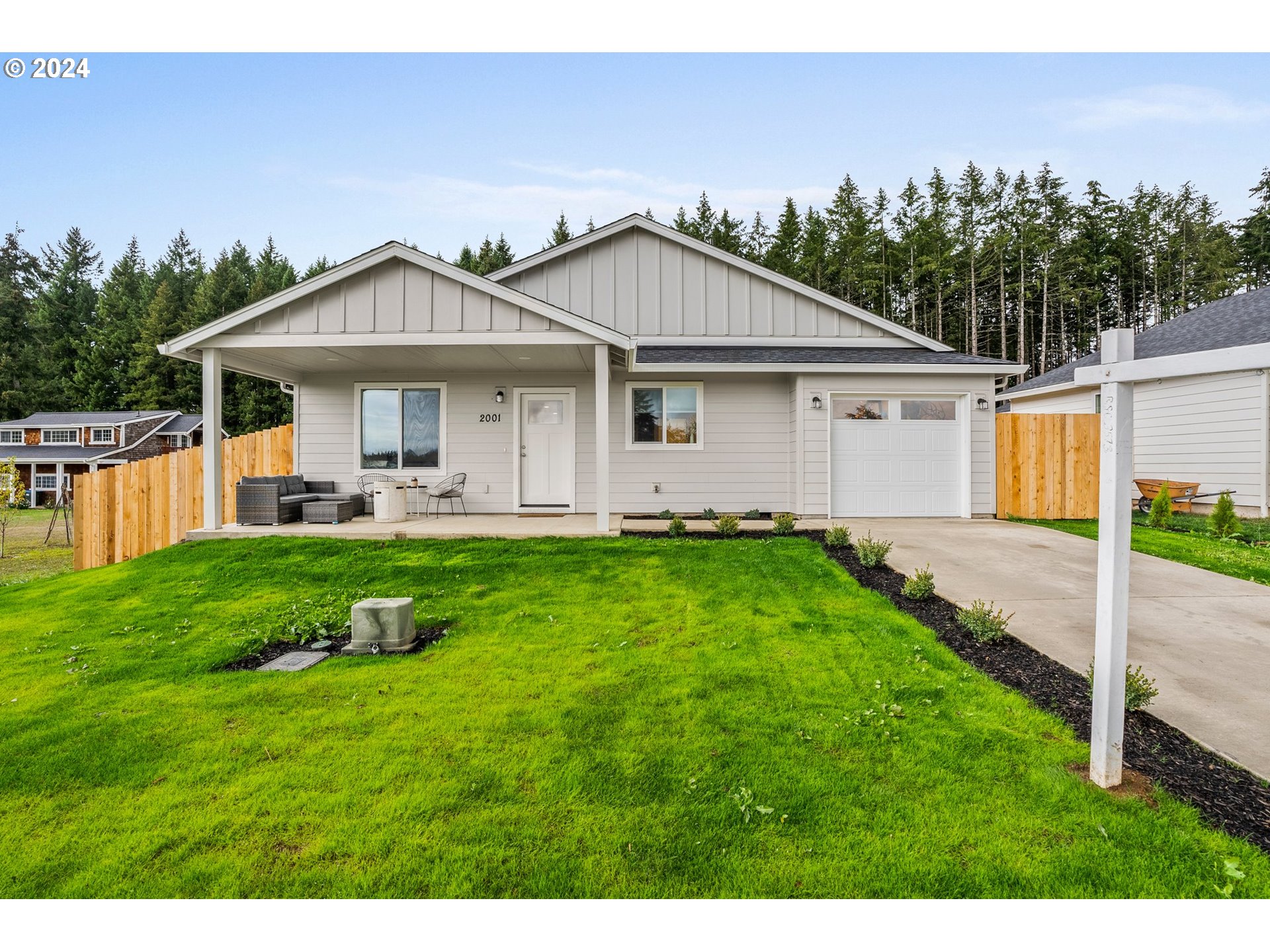 2001 Apple Road Winlock, WA 98596 - Photo 1 of 24 a view of a house with a yard and a garden