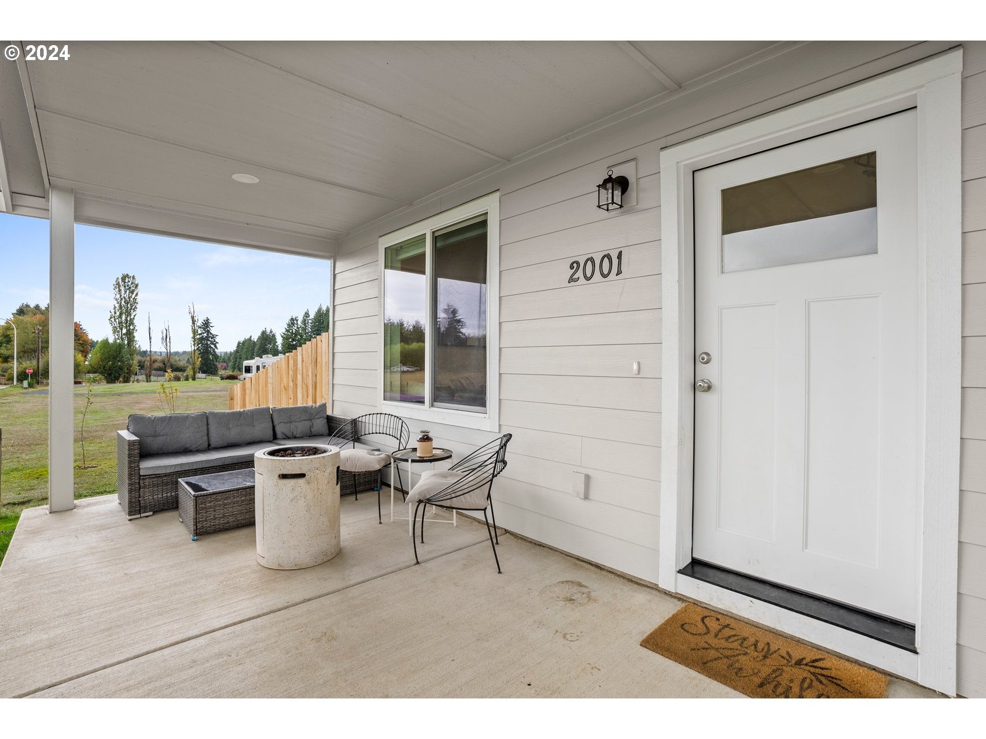 2001 Apple Road Winlock, WA 98596 - Photo 3 of 24 a outdoor space with patio the couches and a dining table with garden view