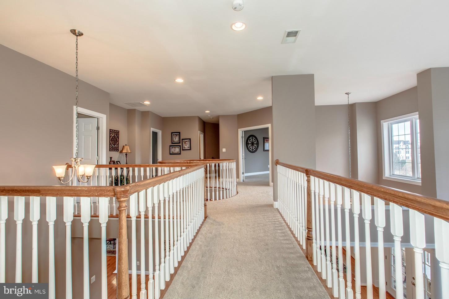 1152 Markell Court Reston, VA 20194 - Photo 11 of 30 a view of a hallway with window and stairs