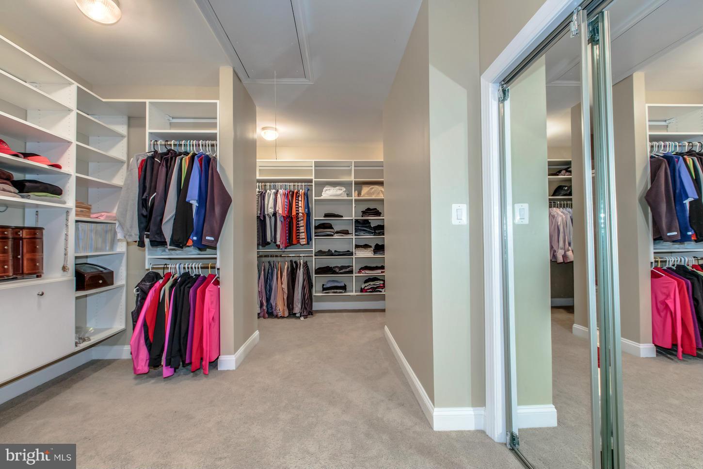 1152 Markell Court Reston, VA 20194 - Photo 15 of 30 a view of walk in closet with clothes and shoes
