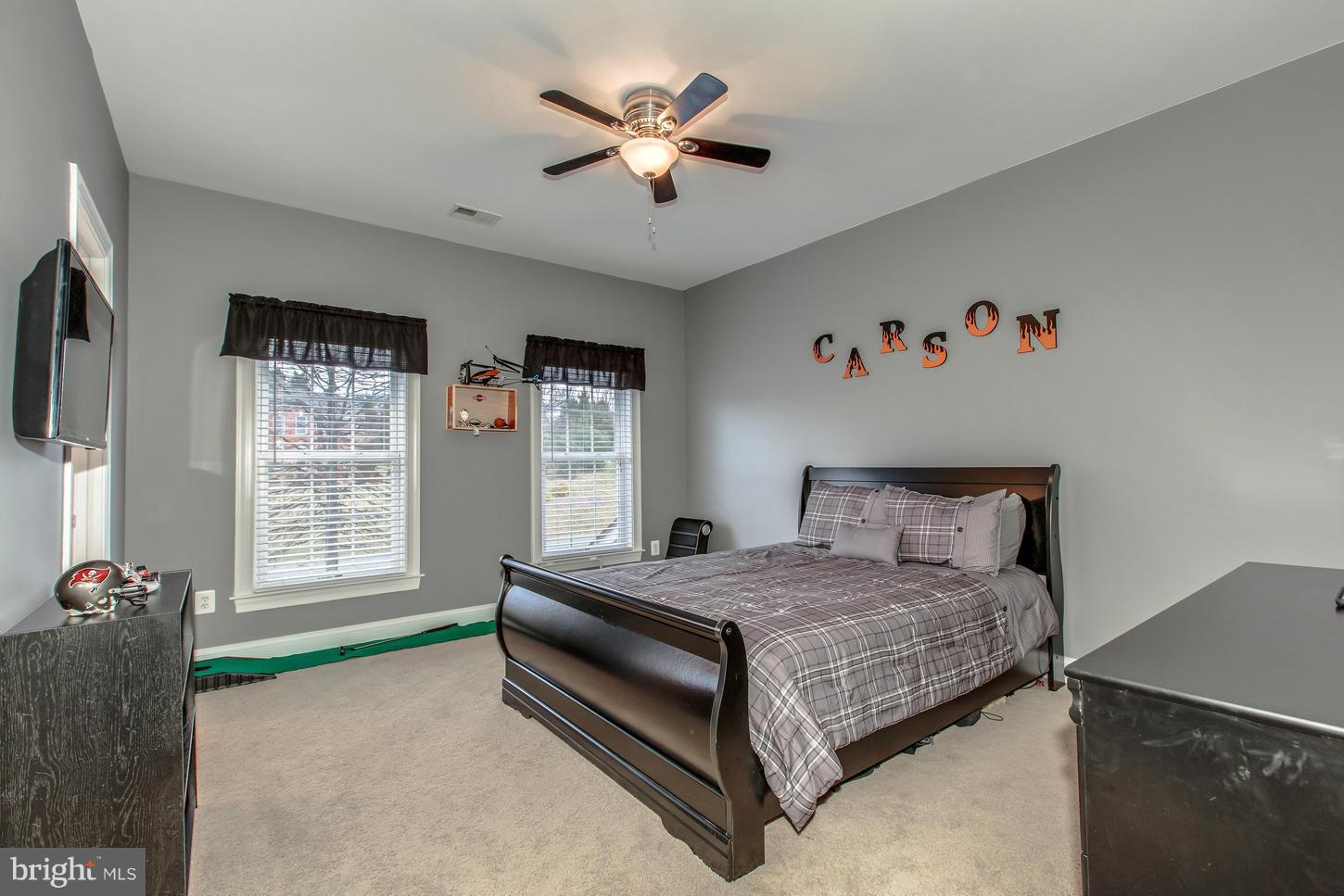 1152 Markell Court Reston, VA 20194 - Photo 17 of 30 a bedroom with a bed dresser and a large window