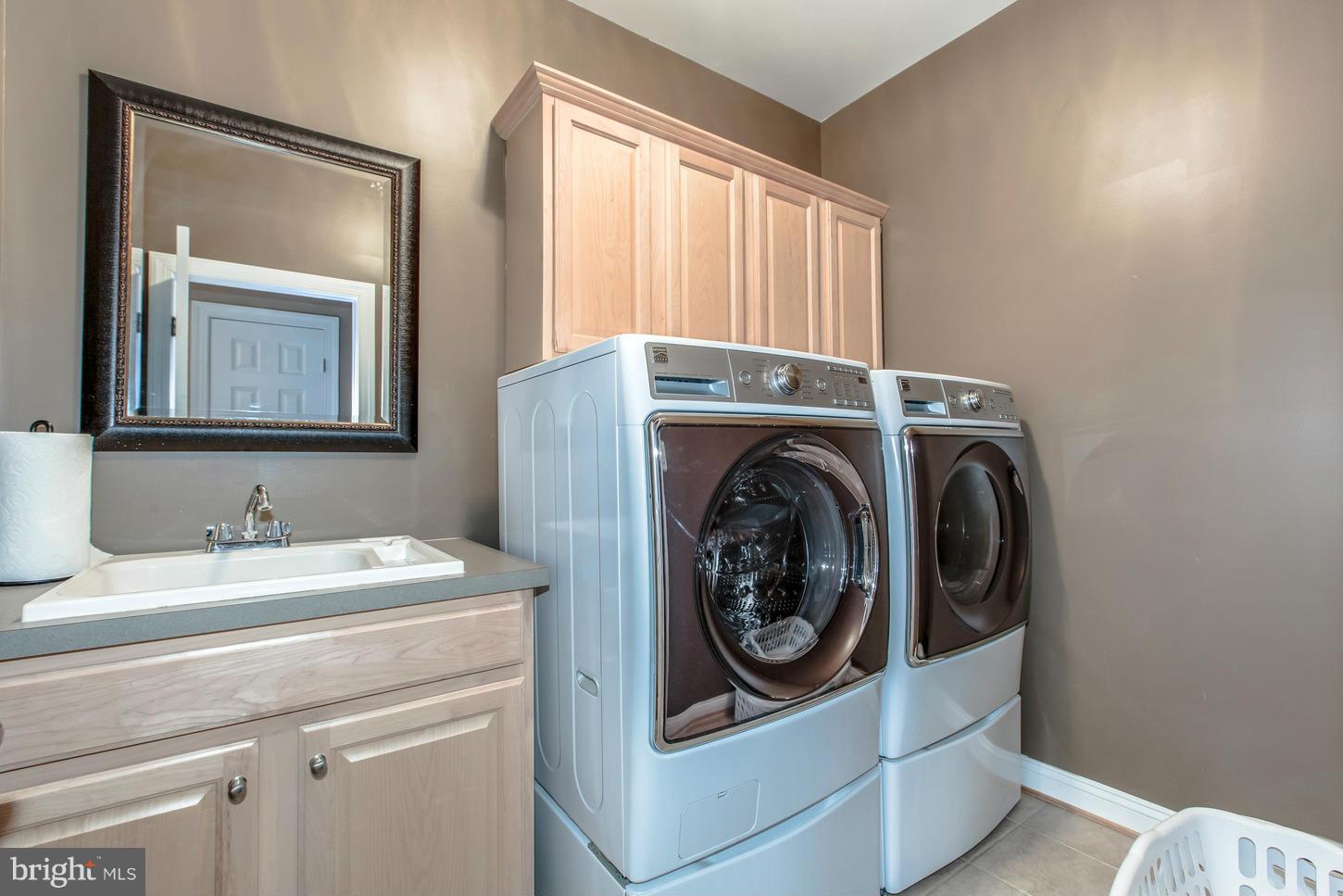 1152 Markell Court Reston, VA 20194 - Photo 21 of 30 a utility room with dryer and washer