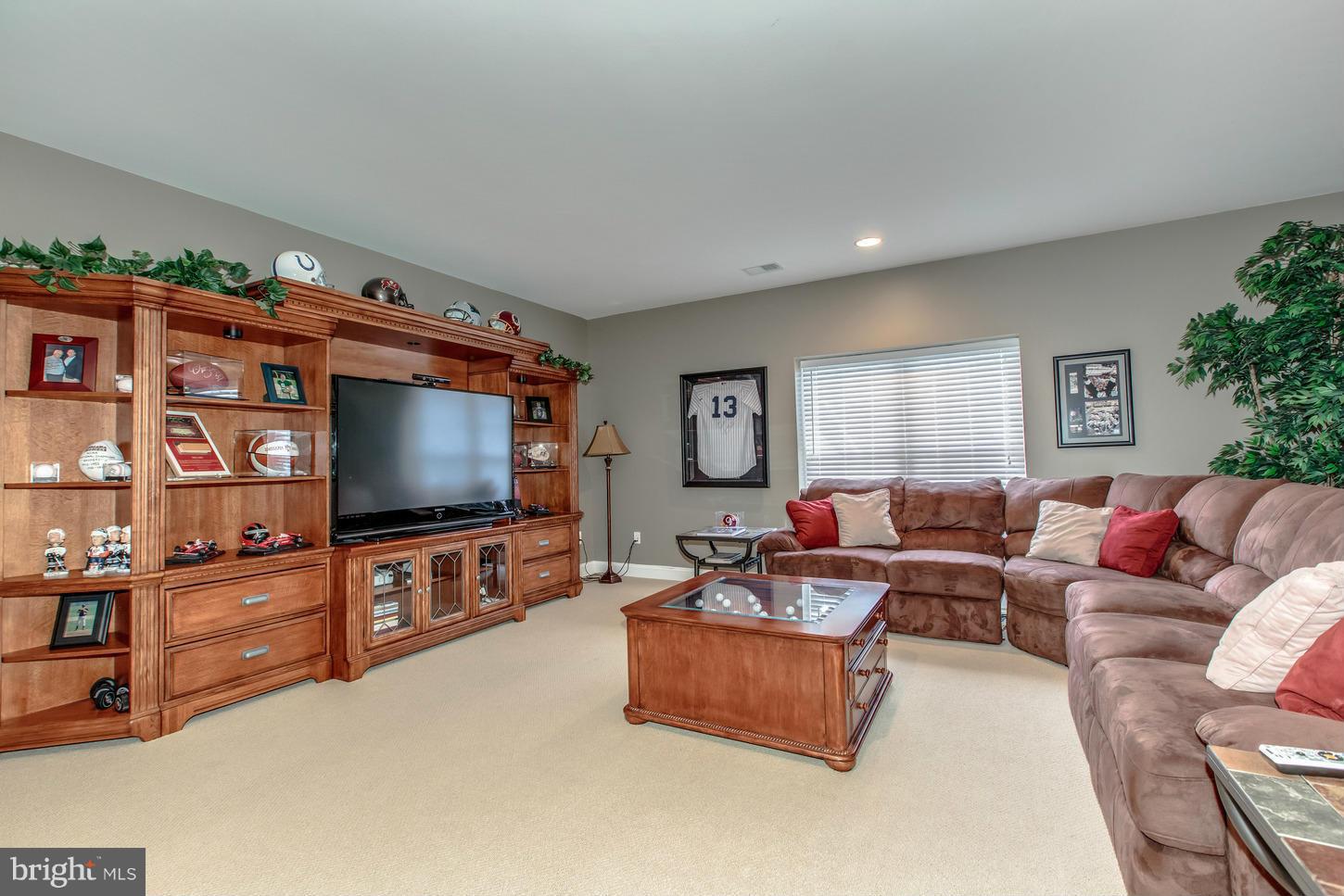 1152 Markell Court Reston, VA 20194 - Photo 22 of 30 a living room with furniture and a flat screen tv