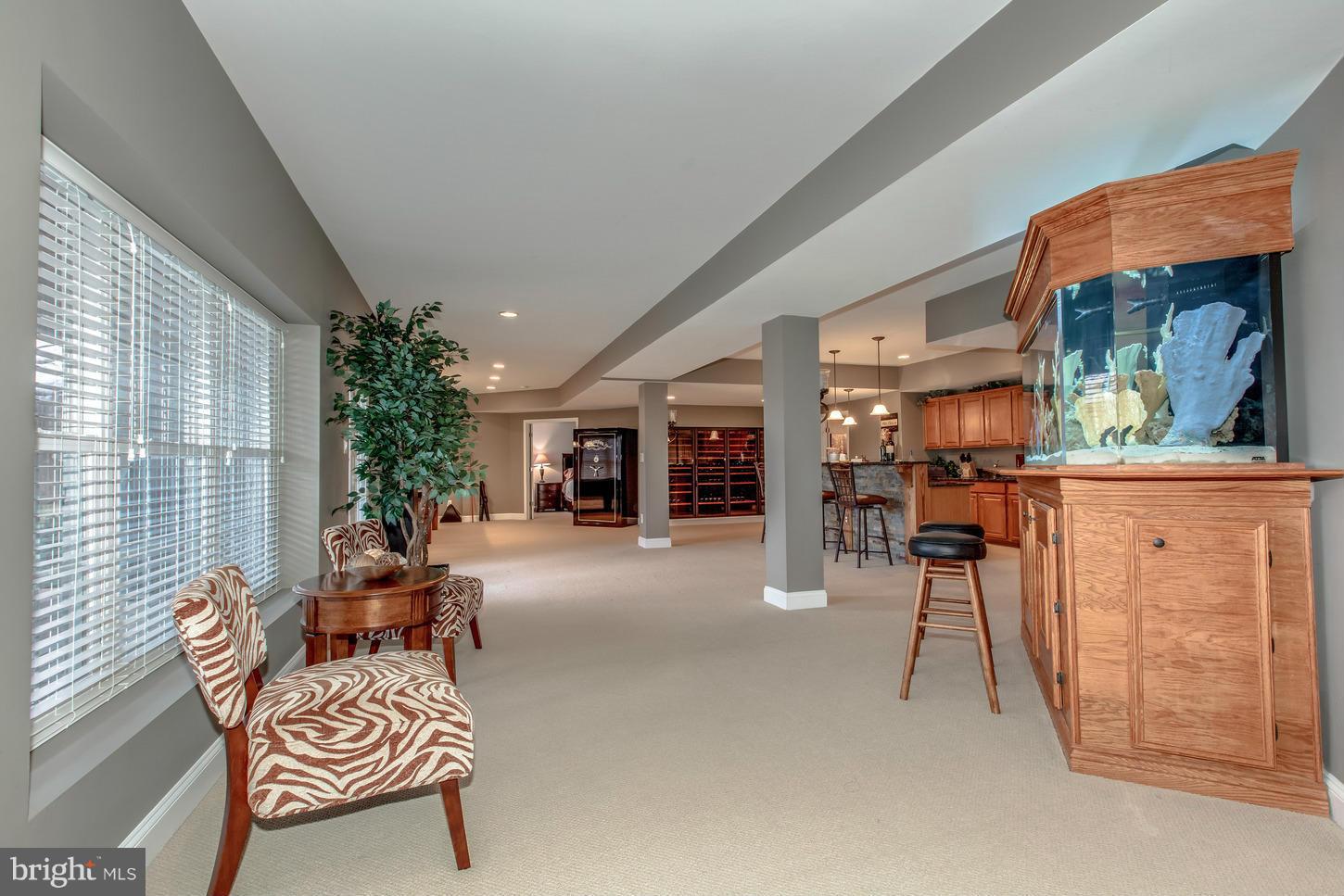 1152 Markell Court Reston, VA 20194 - Photo 23 of 30 a living room with furniture a dining table and chairs