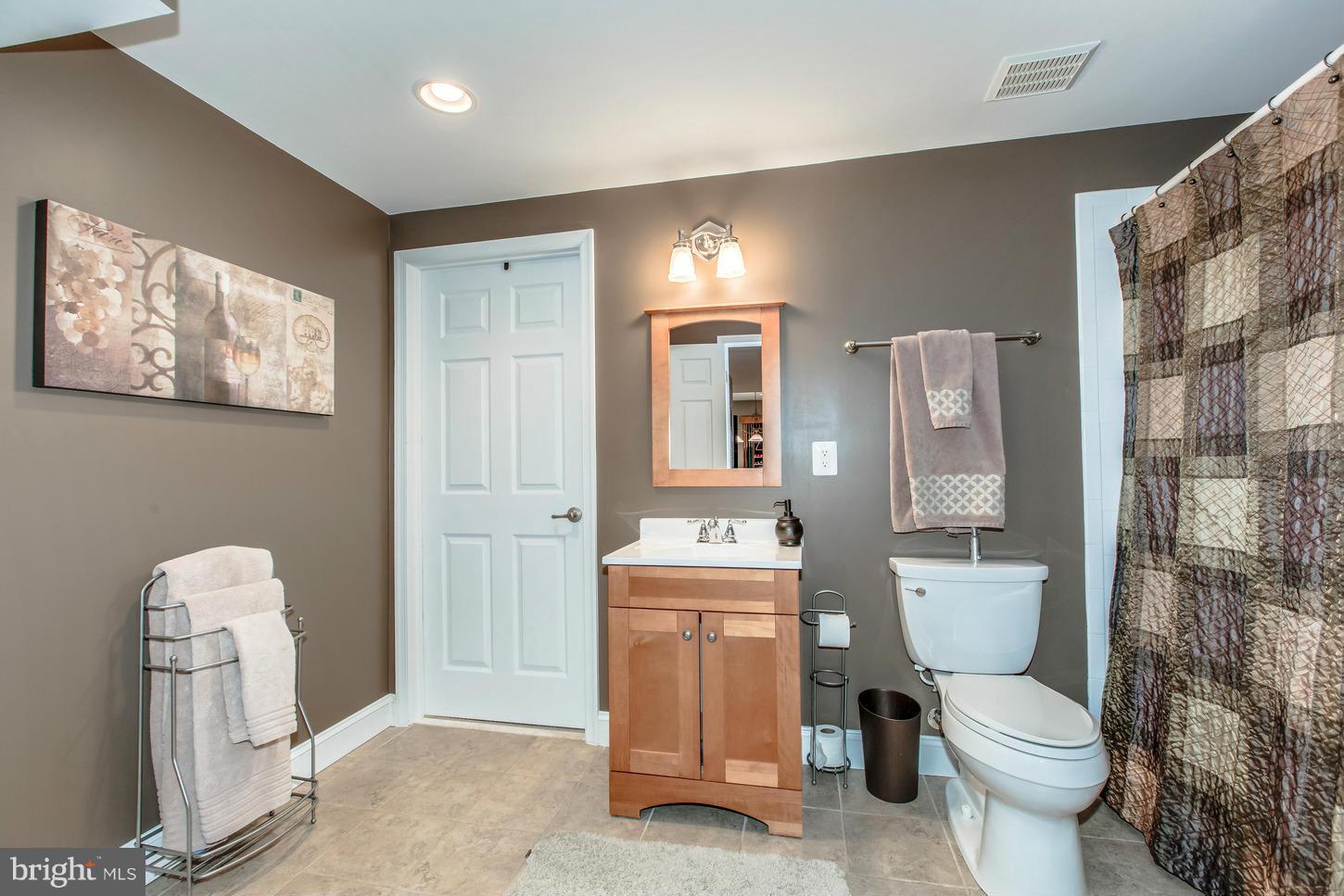 1152 Markell Court Reston, VA 20194 - Photo 28 of 30 a bathroom with a toilet and a sink