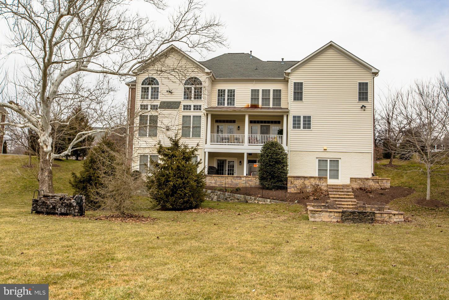 1152 Markell Court Reston, VA 20194 - Photo 30 of 30 a front view of a house with a yard