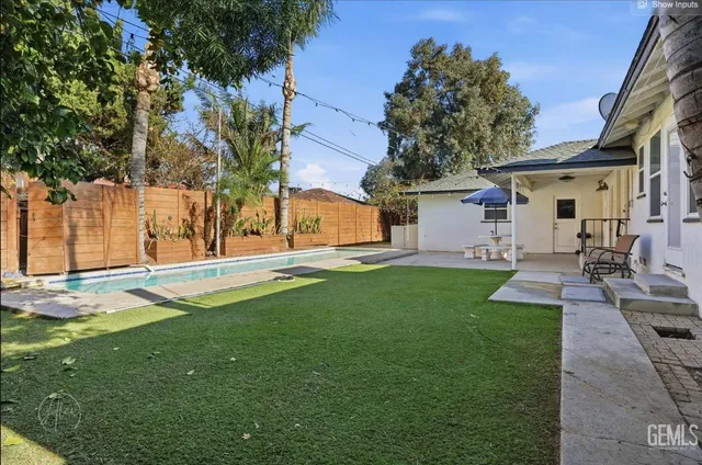 a view of a backyard with a garden