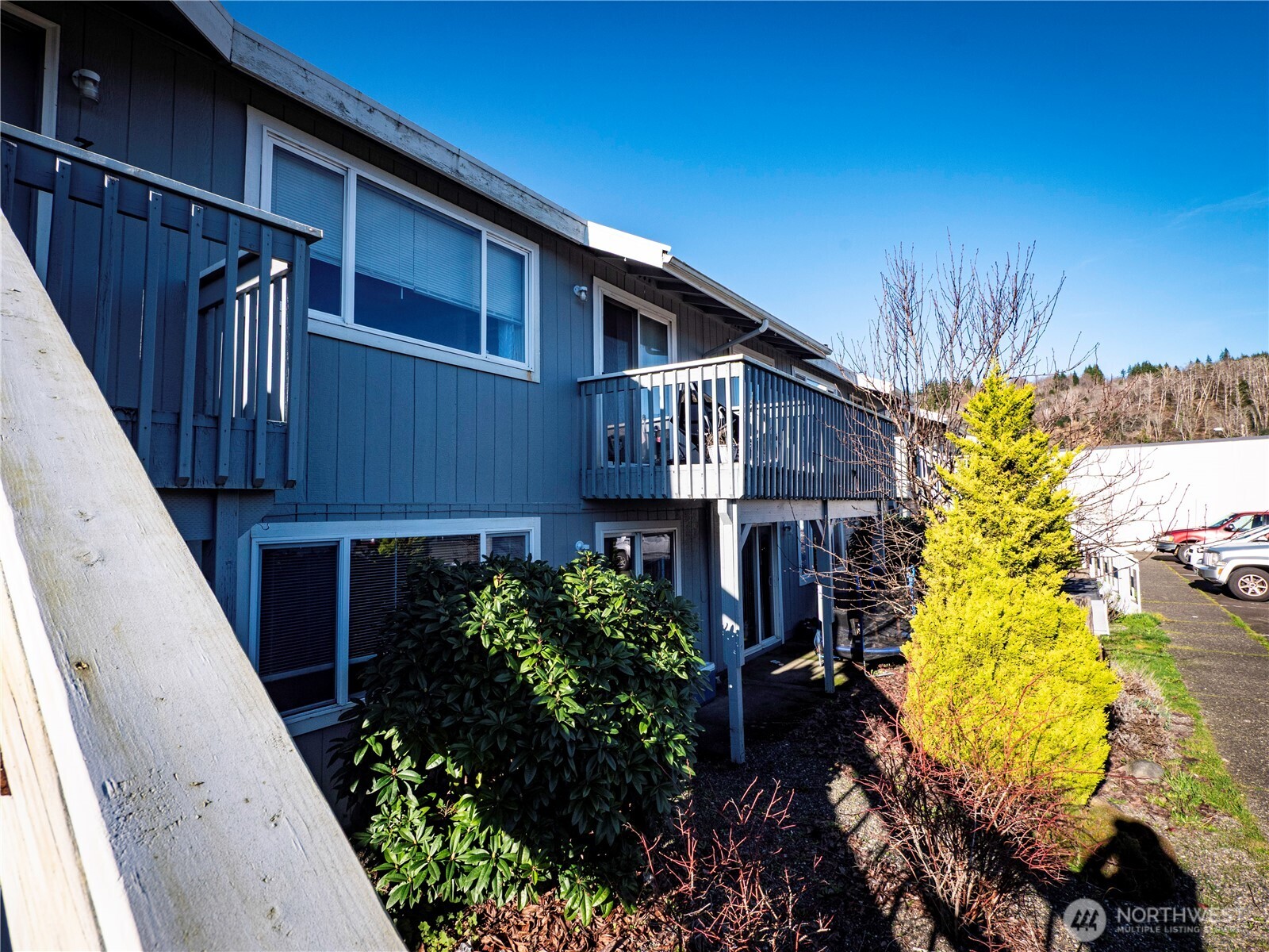 414 Ontario Street Hoquiam, WA 98550 - Photo 20 of 40 a view of a house with a flower garden