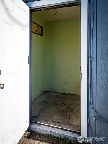 a view of a house with a street