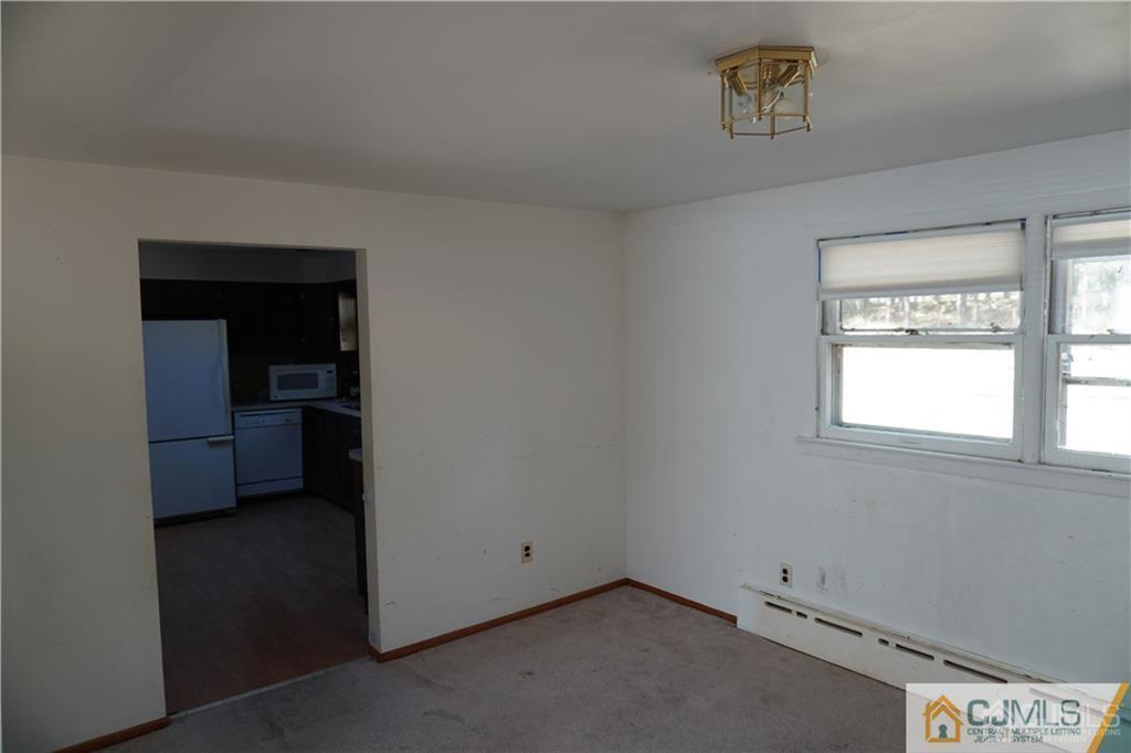 634 Old Stage Road East Brunswick, NJ 08816 - Photo 11 of 17 an empty room with a window