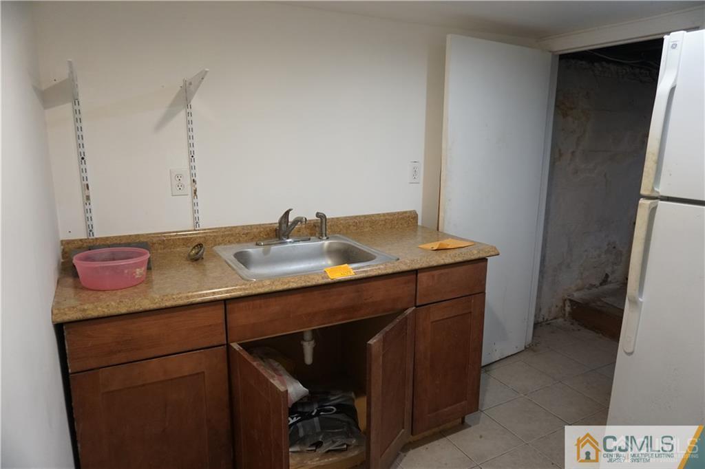634 Old Stage Road East Brunswick, NJ 08816 - Photo 12 of 17 a bathroom with a sink toilet and vanity