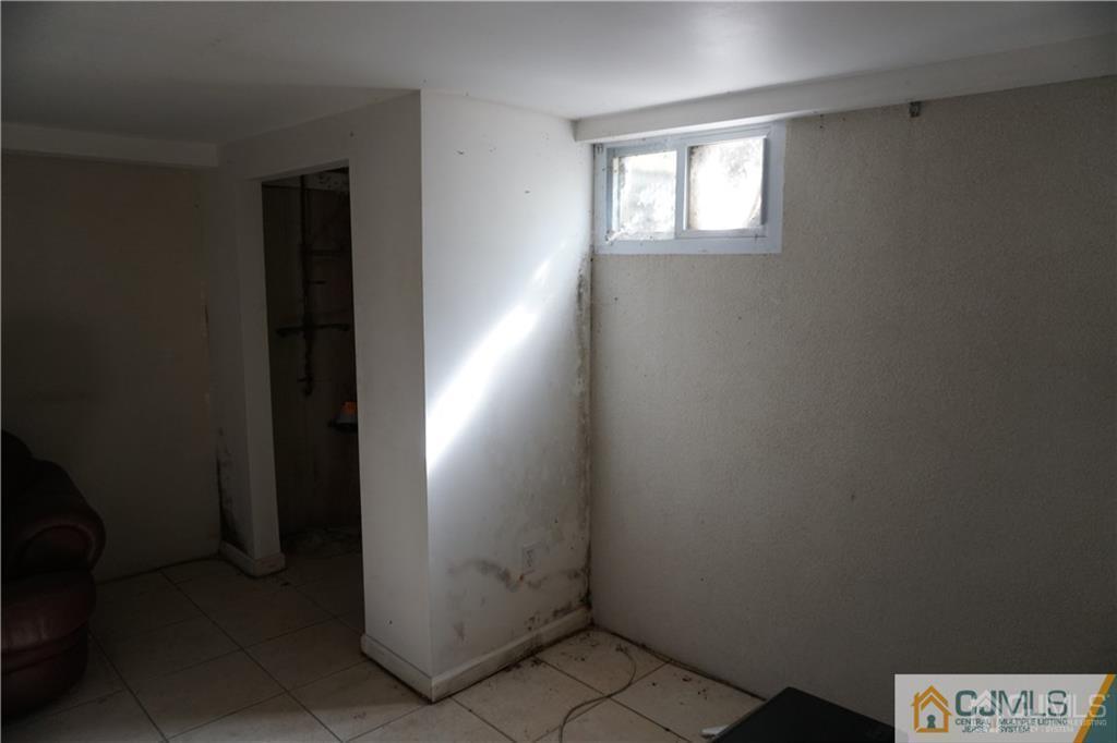 634 Old Stage Road East Brunswick, NJ 08816 - Photo 13 of 17 an empty room with windows