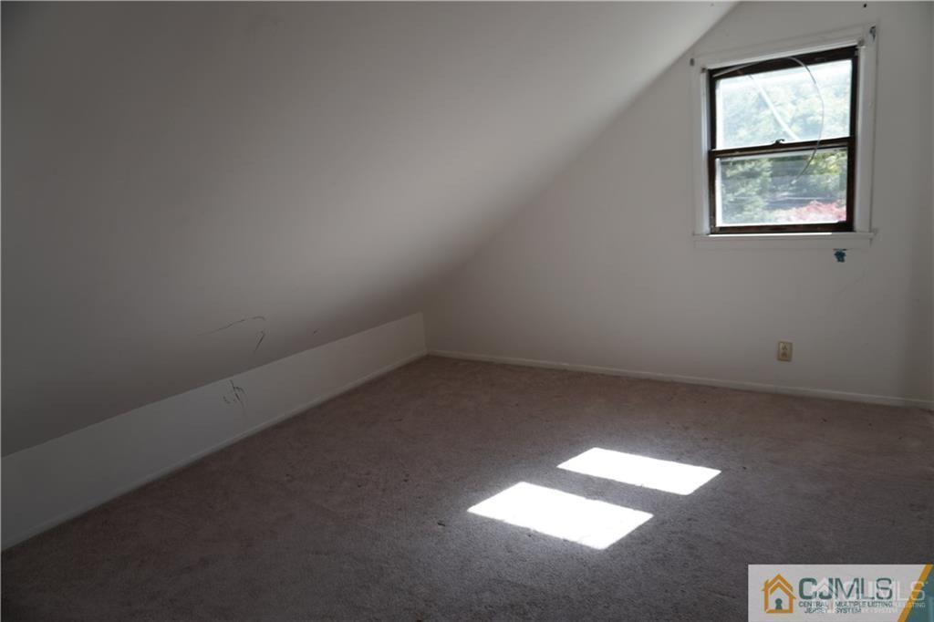 634 Old Stage Road East Brunswick, NJ 08816 - Photo 7 of 17 an empty room with a window