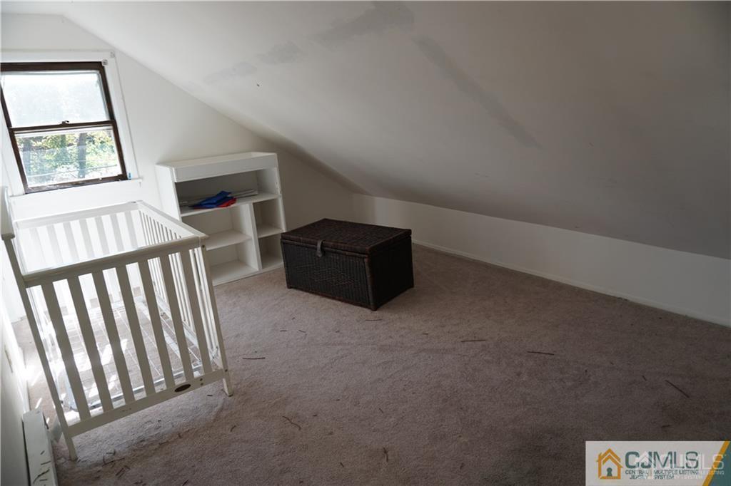 634 Old Stage Road East Brunswick, NJ 08816 - Photo 8 of 17 an empty room with windows