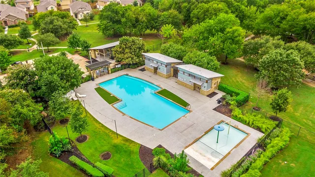 a view of swimming pool with lounge chair