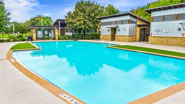 an aerial view of a house with a garden and plants