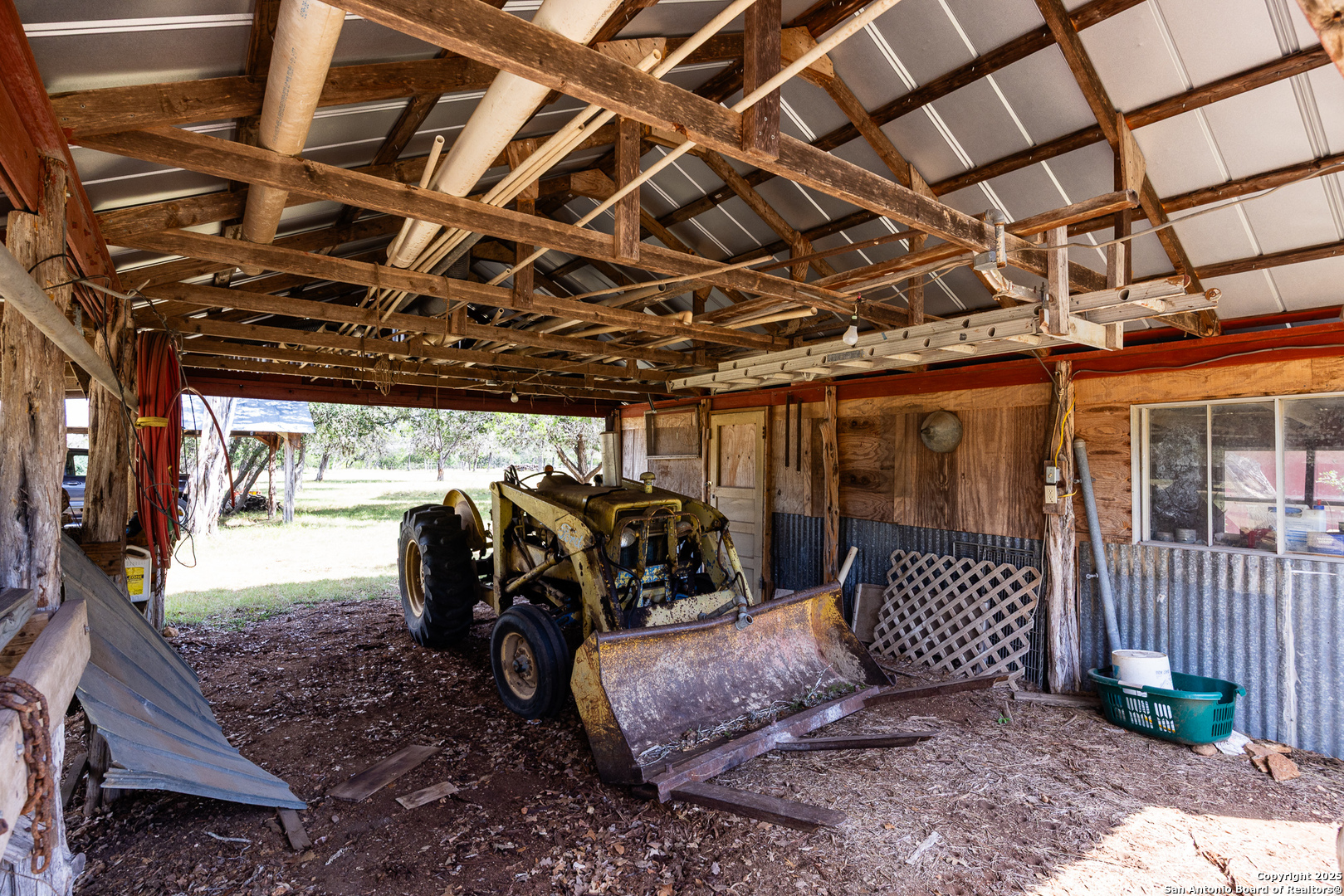 667 Medina Bend Road Medina, TX 78055 - Photo 16 of 40 a view of chairs and utility room