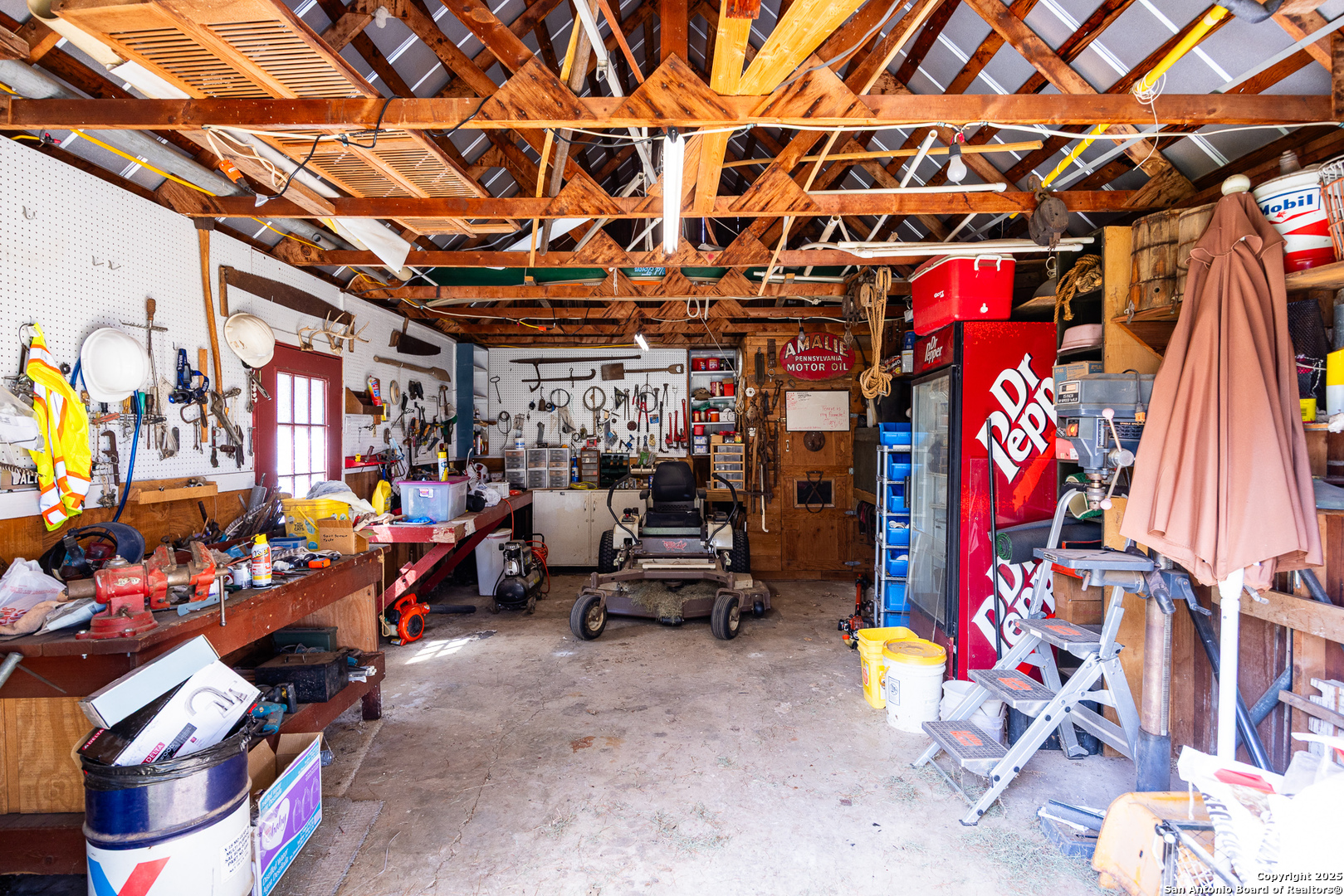 667 Medina Bend Road Medina, TX 78055 - Photo 18 of 40 a view of gym equipment with retail shops