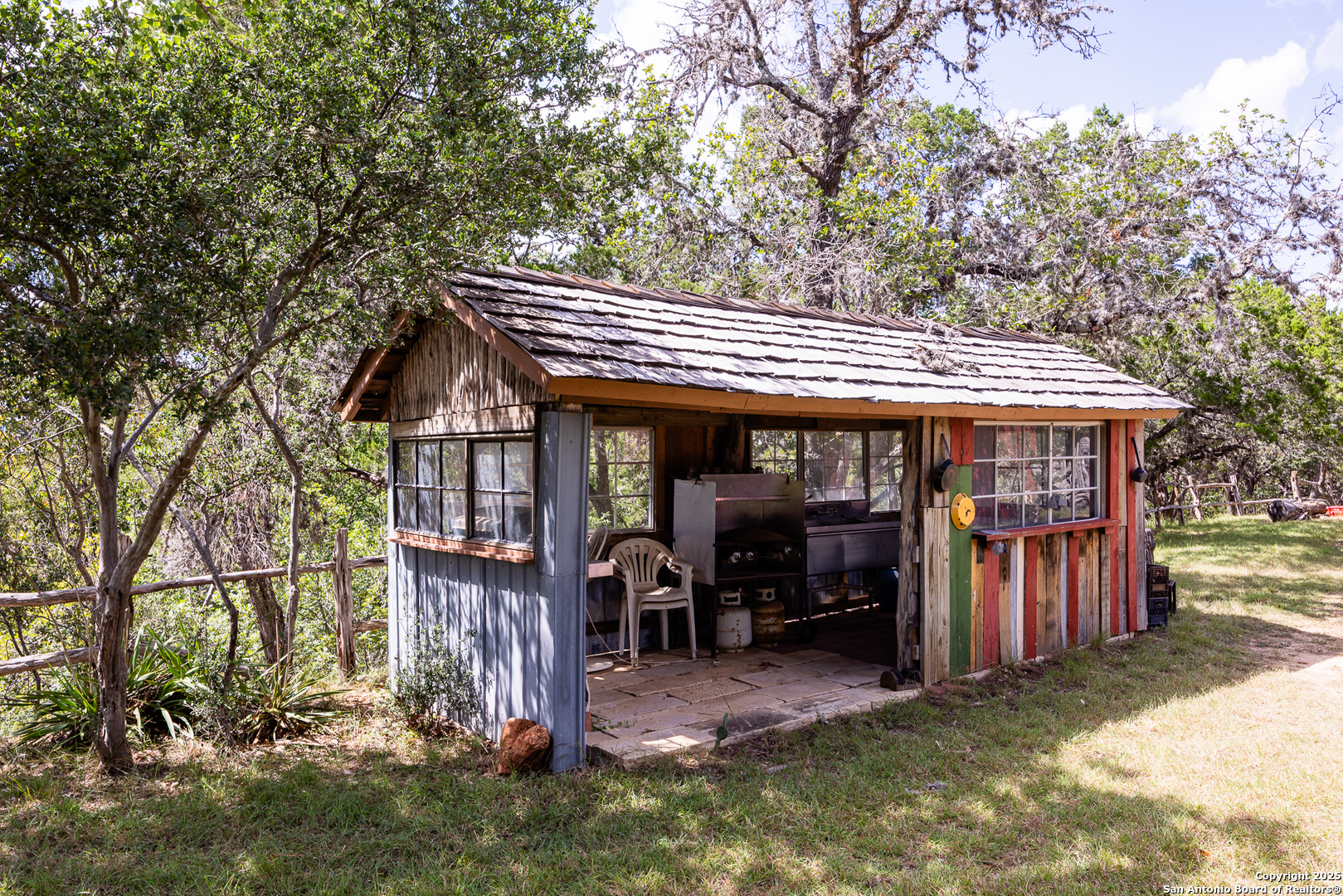 667 Medina Bend Road Medina, TX 78055 - Photo 19 of 40 an outdoor space with lots of furniture and shower