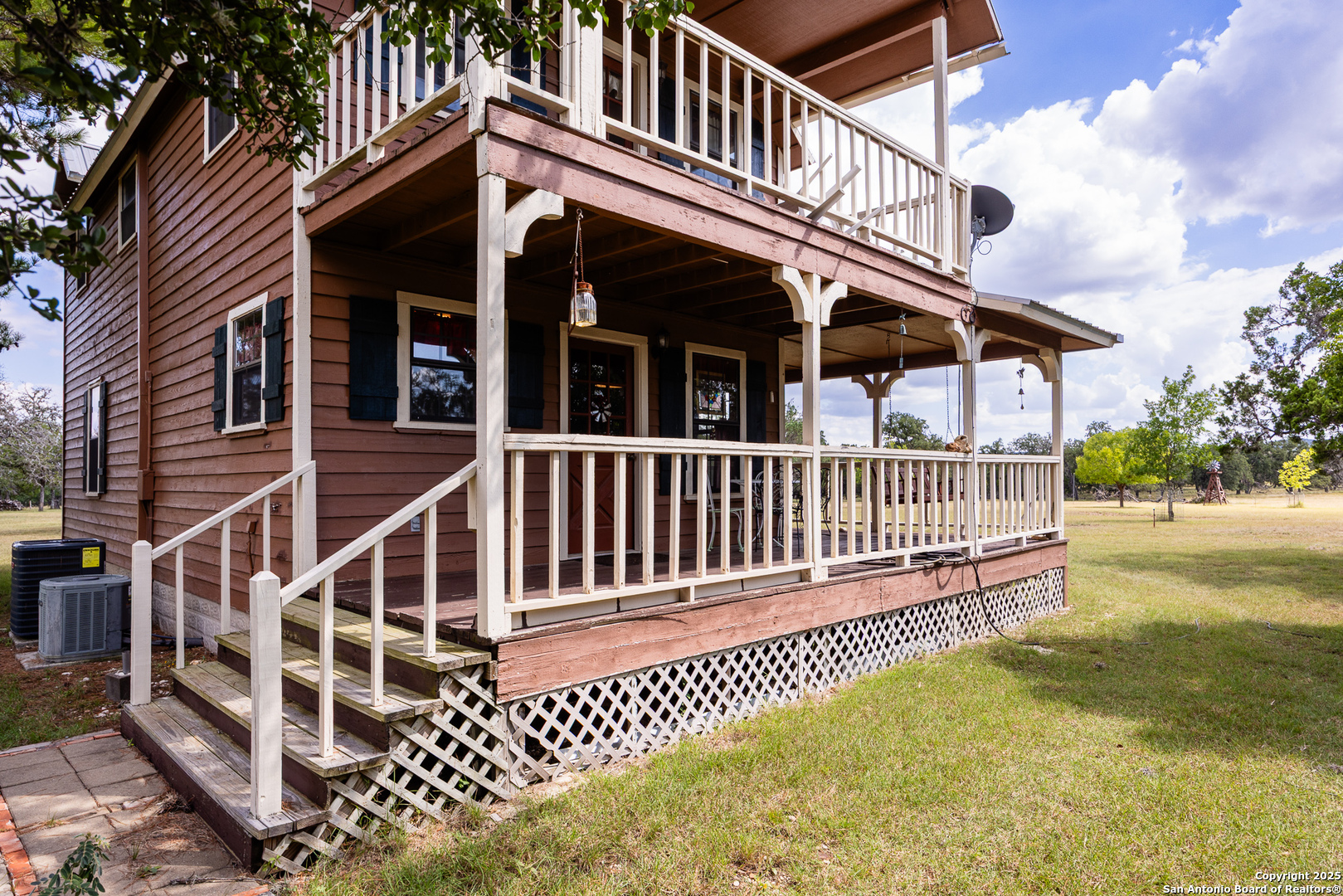 667 Medina Bend Road Medina, TX 78055 - Photo 3 of 40 front view of a house with a deck