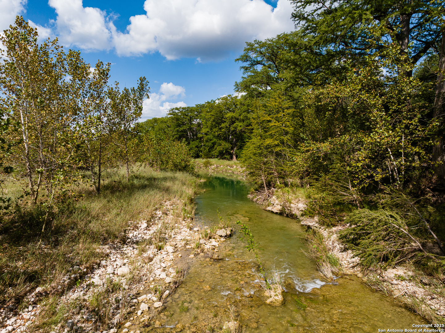 667 Medina Bend Road Medina, TX 78055 - Photo 35 of 40 a view of a lake with houses