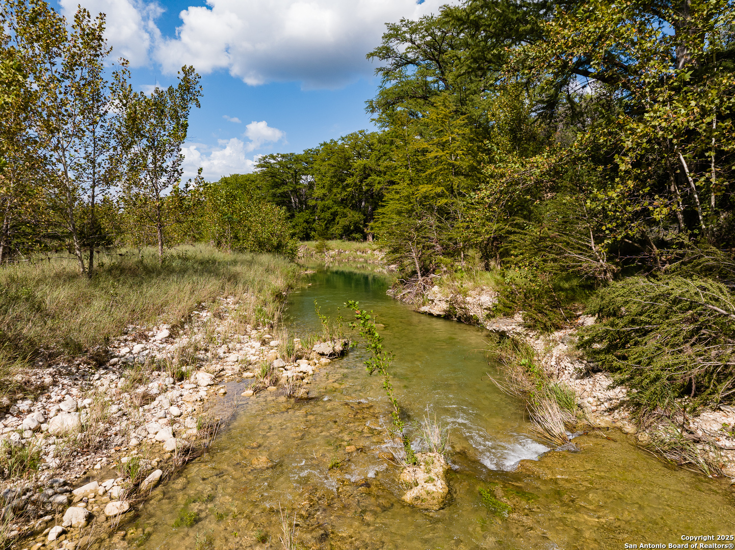 667 Medina Bend Road Medina, TX 78055 - Photo 36 of 40 a view of a lake with houses