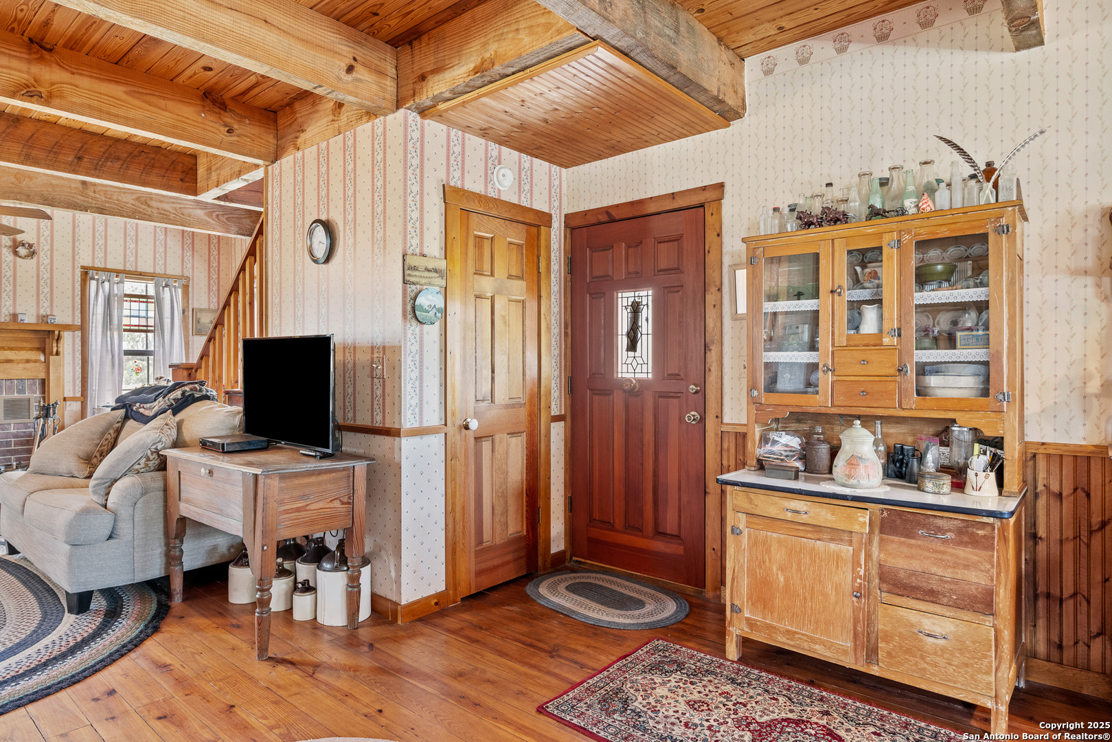 667 Medina Bend Road Medina, TX 78055 - Photo 6 of 40 a living room with furniture and wooden floor