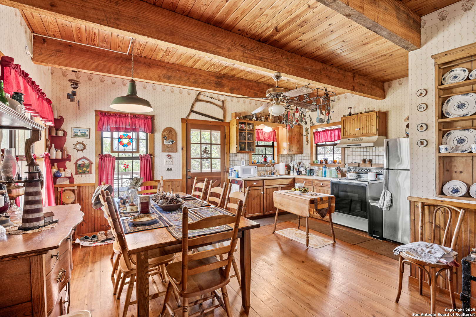 667 Medina Bend Road Medina, TX 78055 - Photo 8 of 40 a view of a chairs and tables in a room
