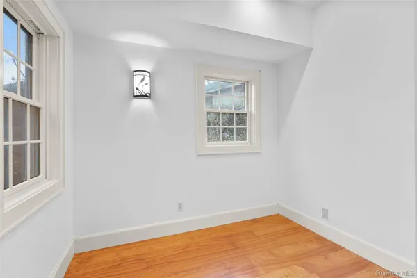 a view of empty room with windows