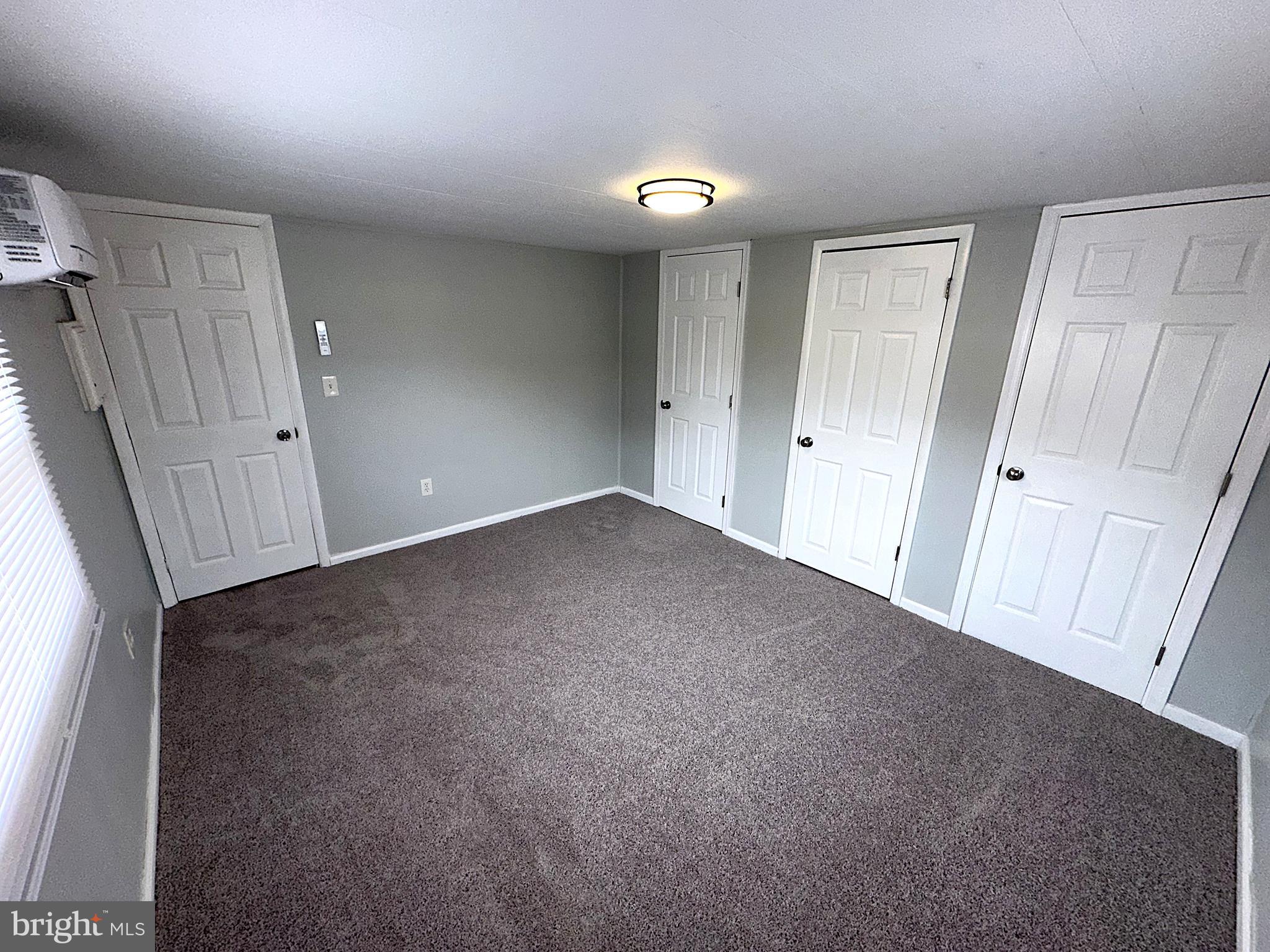 2400 Lincoln Avenue, Unit 15 Sparrows Point, MD 21219 - Photo 13 of 24 a view of an empty room and a window
