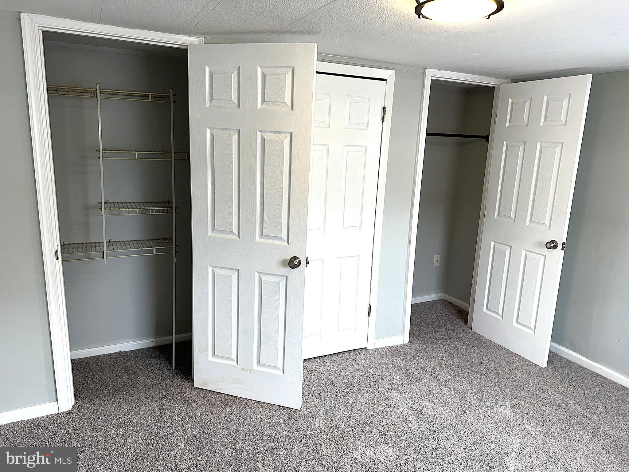 2400 Lincoln Avenue, Unit 15 Sparrows Point, MD 21219 - Photo 14 of 24 an empty room with windows