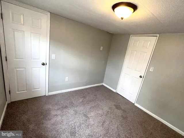 a view of livingroom with washer and dryer