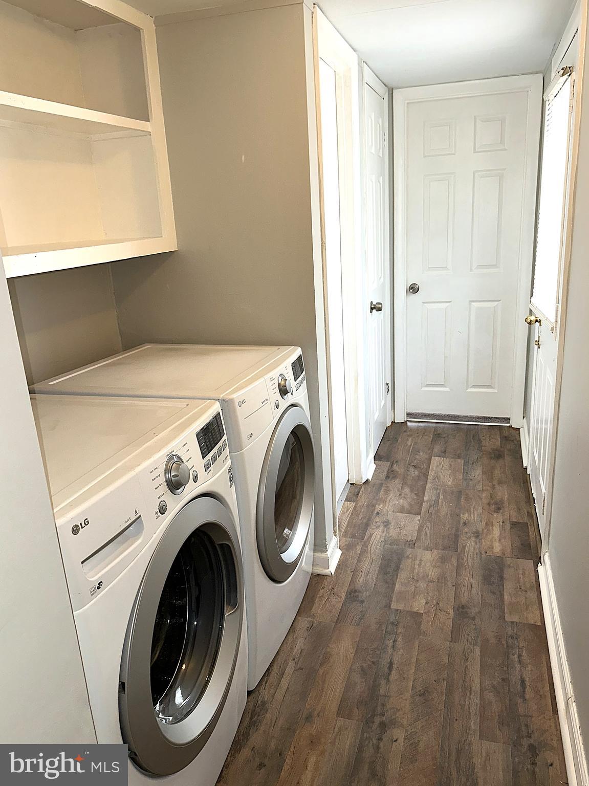 2400 Lincoln Avenue, Unit 15 Sparrows Point, MD 21219 - Photo 19 of 24 a view of livingroom with washer and dryer