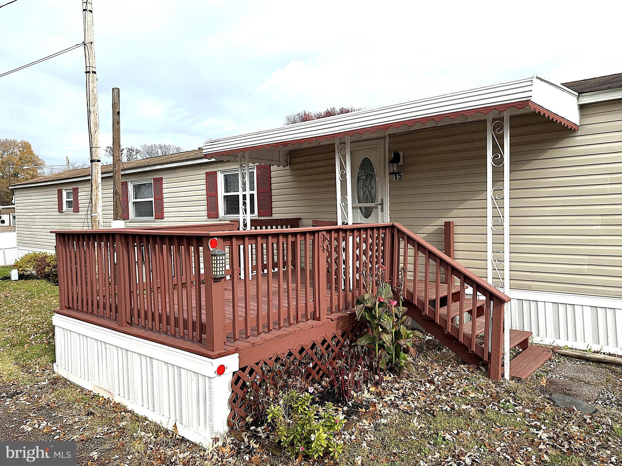 2400 Lincoln Avenue, Unit 15 Sparrows Point, MD 21219 - Photo 20 of 24 a view of a house with wooden fence
