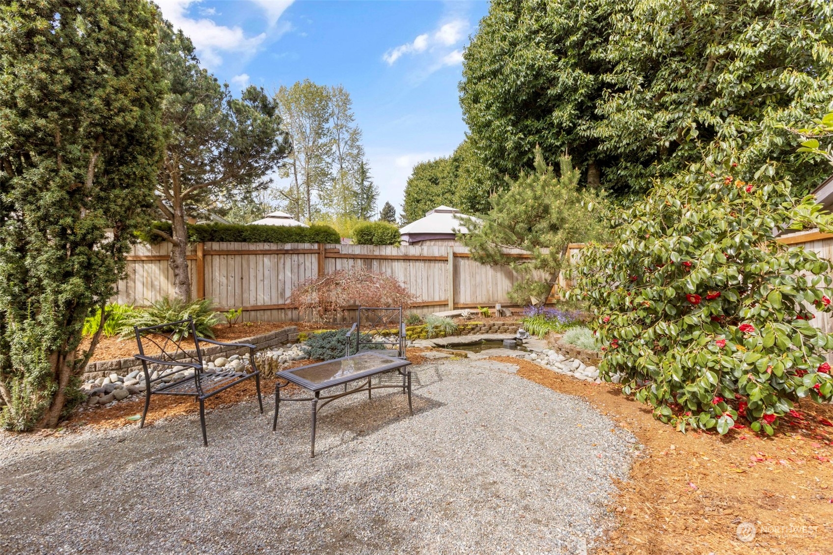 2305 Main Court South Renton, WA 98055 - Photo 34 of 39 a backyard of a house with table and chairs
