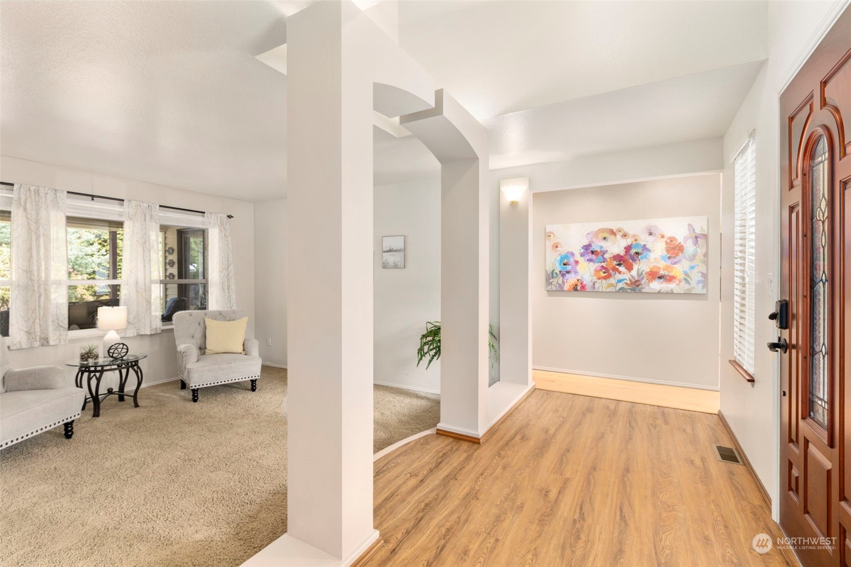 2305 Main Court South Renton, WA 98055 - Photo 5 of 39 a view of a livingroom with wooden floor and furniture
