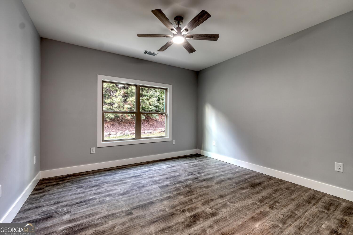 98 Brett Way, Unit F Hiawassee, GA 30546 - Photo 24 of 40 a view of an empty room with a window