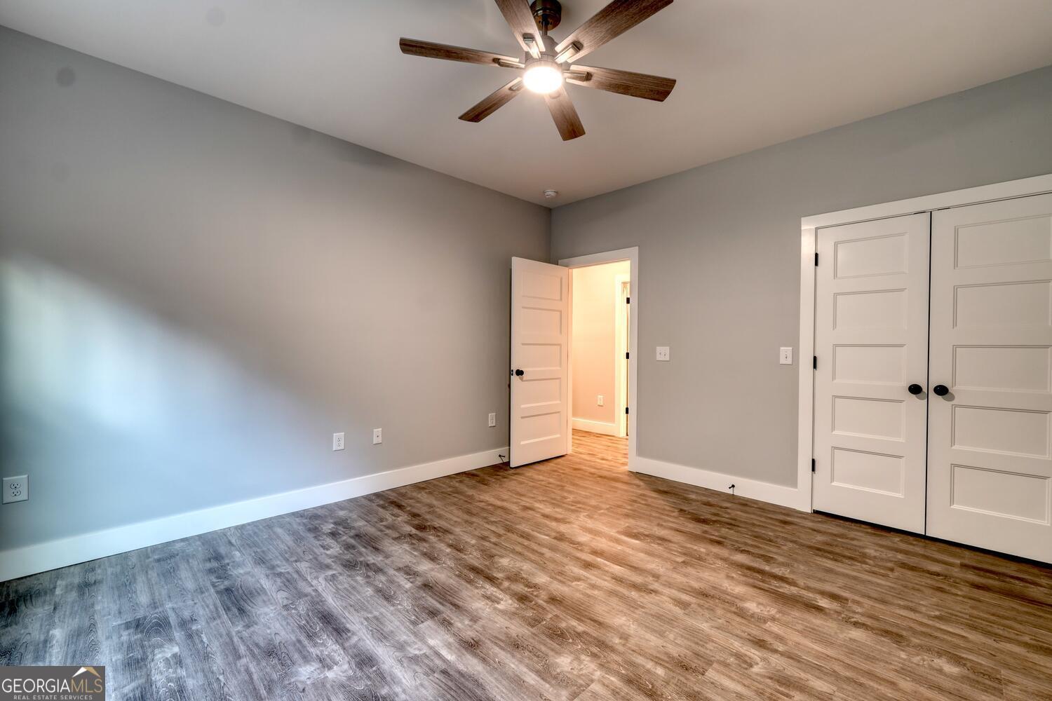 98 Brett Way, Unit F Hiawassee, GA 30546 - Photo 28 of 40 wooden floor in an empty room