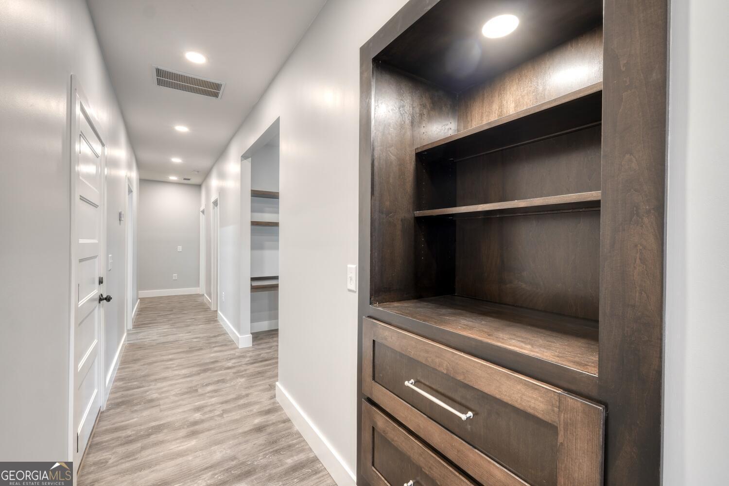 98 Brett Way, Unit F Hiawassee, GA 30546 - Photo 7 of 40 a view of hallway with wooden floor