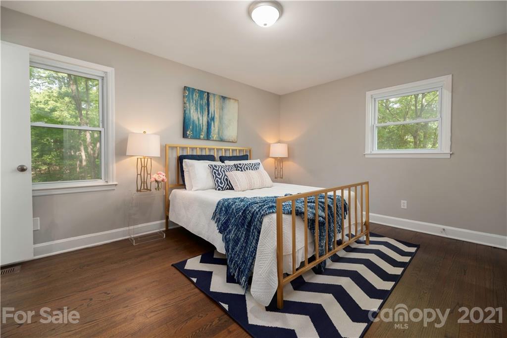 7316 Watercrest Road Charlotte, NC 28210 - Photo 14 of 28 a bedroom with a bed and a window