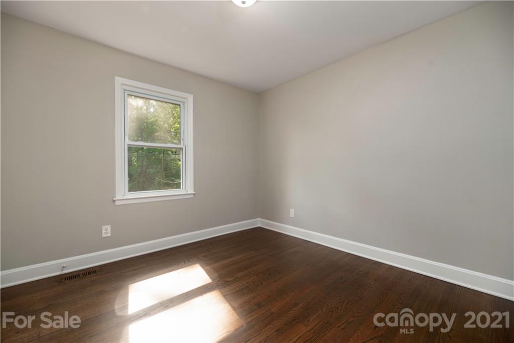 7316 Watercrest Road Charlotte, NC 28210 - Photo 18 of 28 an empty room with a window