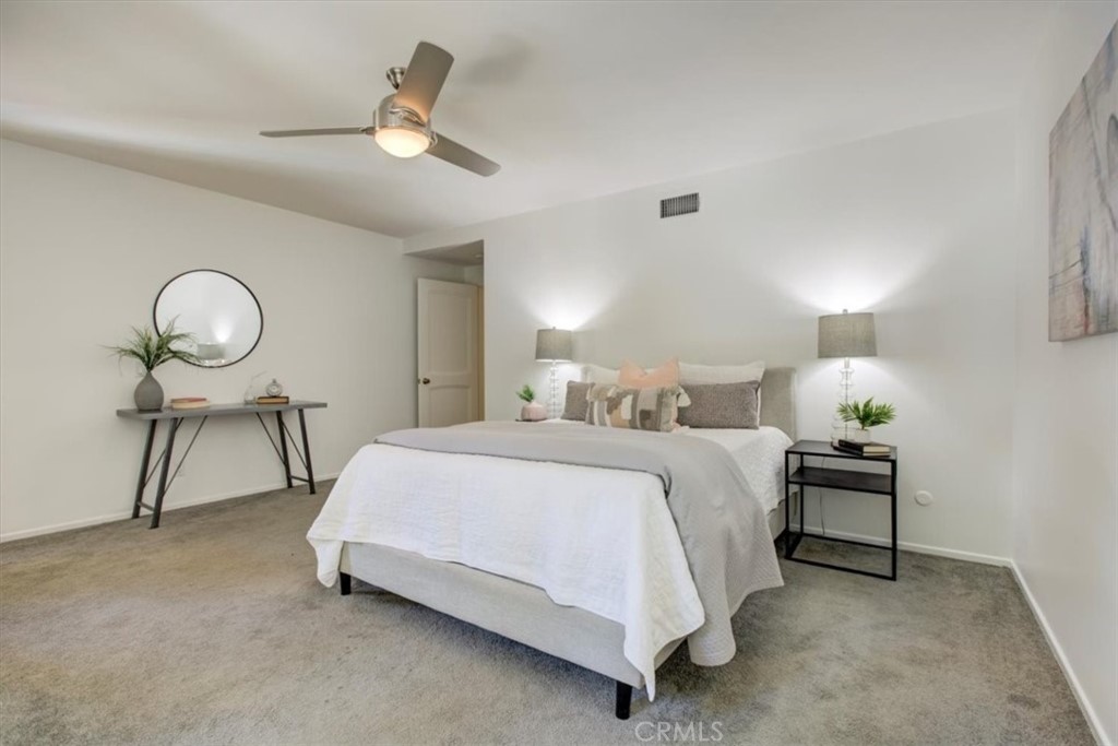 1980 El Arbolita Drive Glendale, CA 91208 - Photo 25 of 43 a bed room with a bed and a lamp