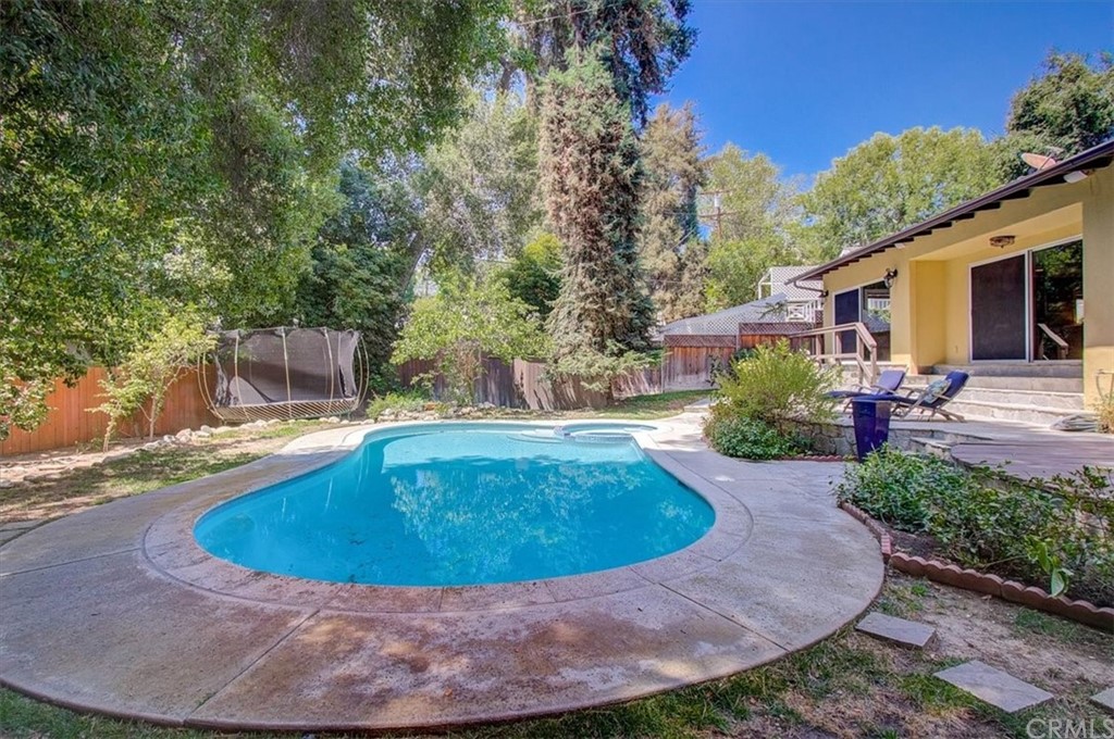 1980 El Arbolita Drive Glendale, CA 91208 - Photo 34 of 43 a view of a house with pool yard and sitting area