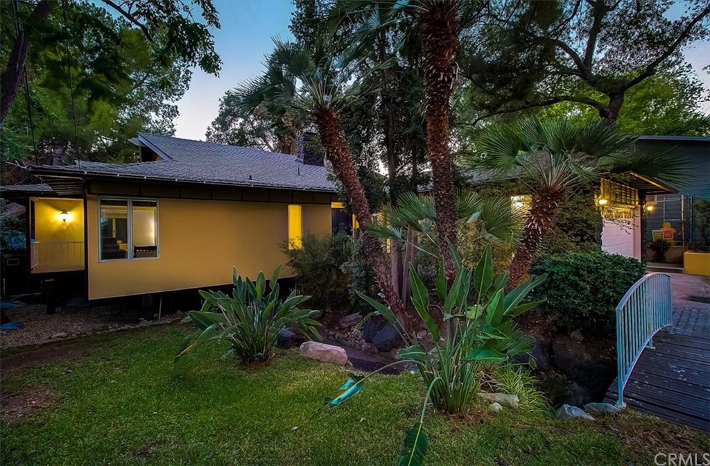 1980 El Arbolita Drive Glendale, CA 91208 - Photo 38 of 43 a front view of a house with garden