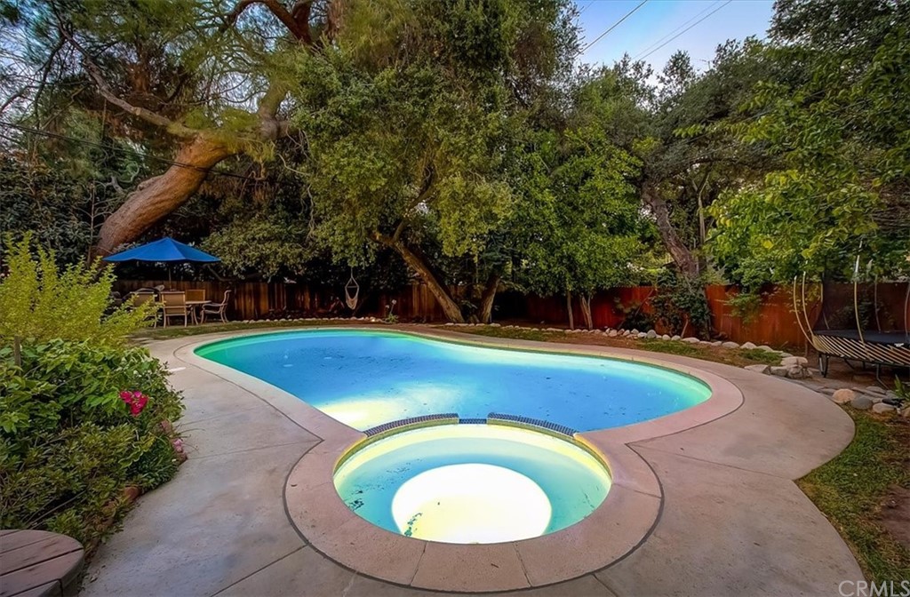 1980 El Arbolita Drive Glendale, CA 91208 - Photo 41 of 43 a view of a swimming pool with a patio