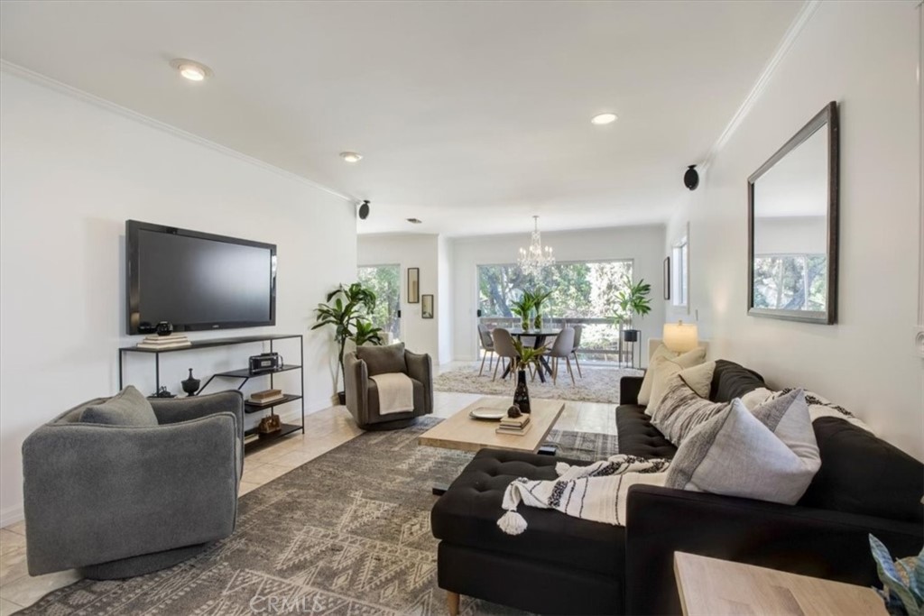 1980 El Arbolita Drive Glendale, CA 91208 - Photo 5 of 43 a living room with furniture and a flat screen tv