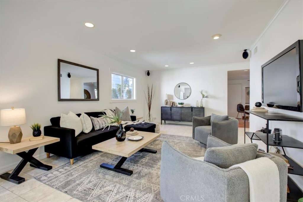 1980 El Arbolita Drive Glendale, CA 91208 - Photo 7 of 43 a living room with furniture and view of kitchen
