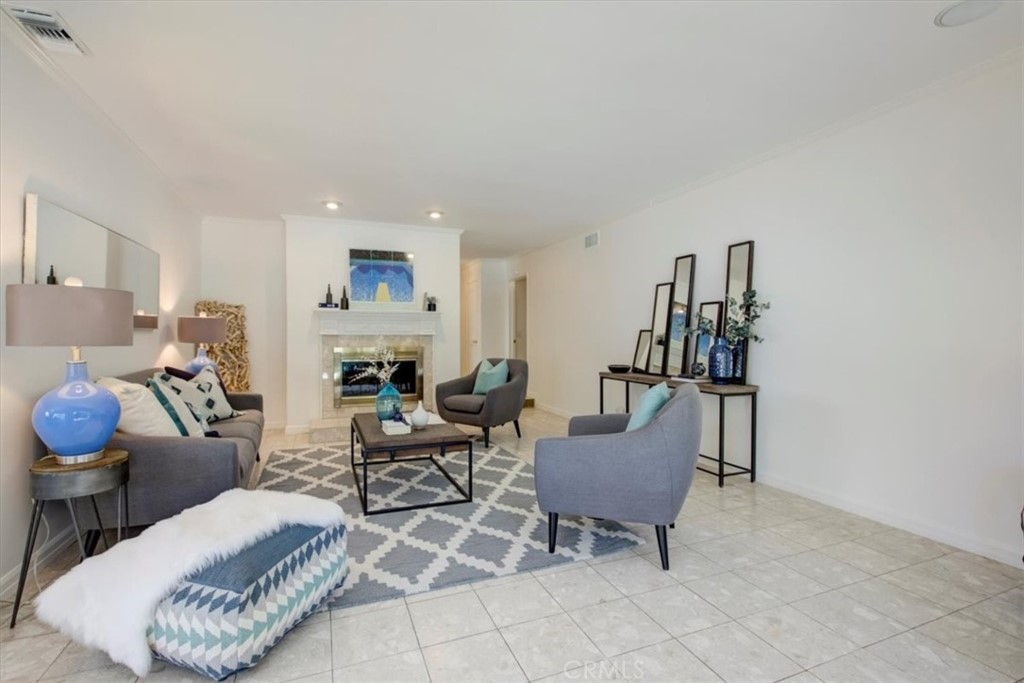 1980 El Arbolita Drive Glendale, CA 91208 - Photo 8 of 43 a living room with furniture and a wooden floor