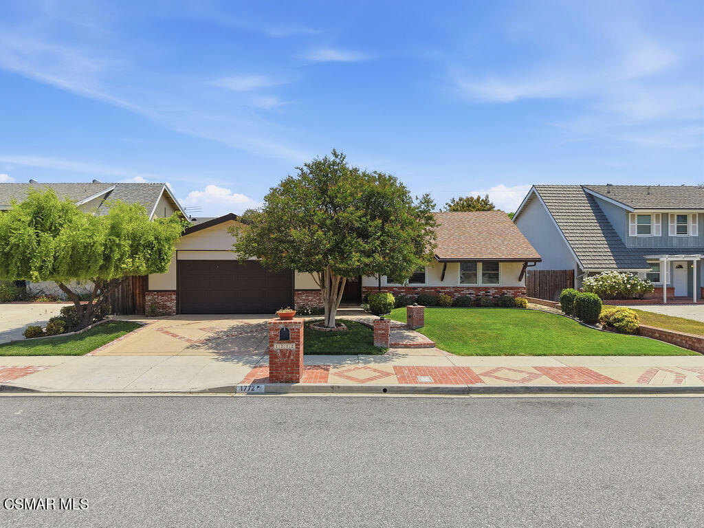 1772 Fred Avenue Simi Valley, CA 93065 - Photo 2 of 43 a view of backyard of house with seating space and trees in the background