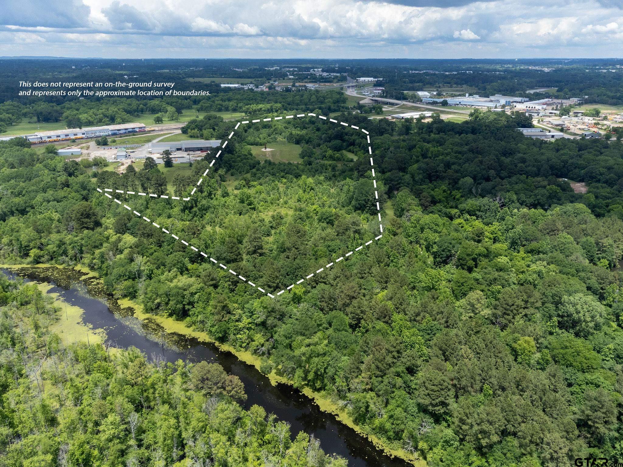 Tbd Dancinger Road Longview, TX 75603 - Photo 12 of 21 a view of a lake with a city